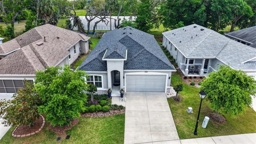Aerial view of the home, shows the rear neighbor's 13 acre working farm's equipment barn.