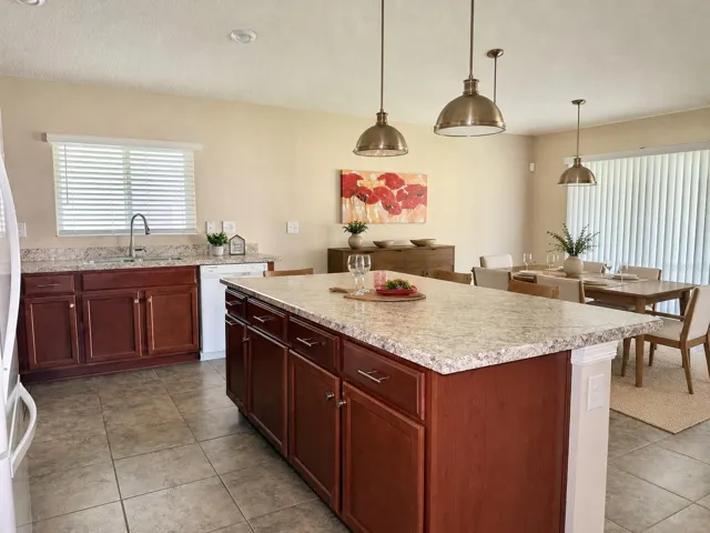 Staged - Kitchen and Dining Area