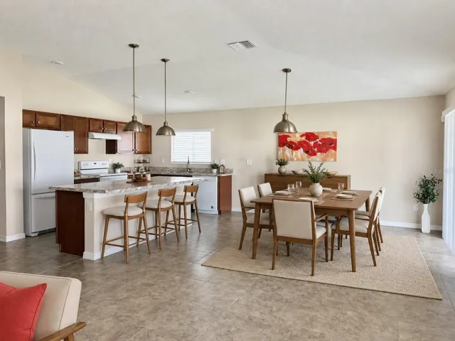 Staged - Kitchen and Dining Area
