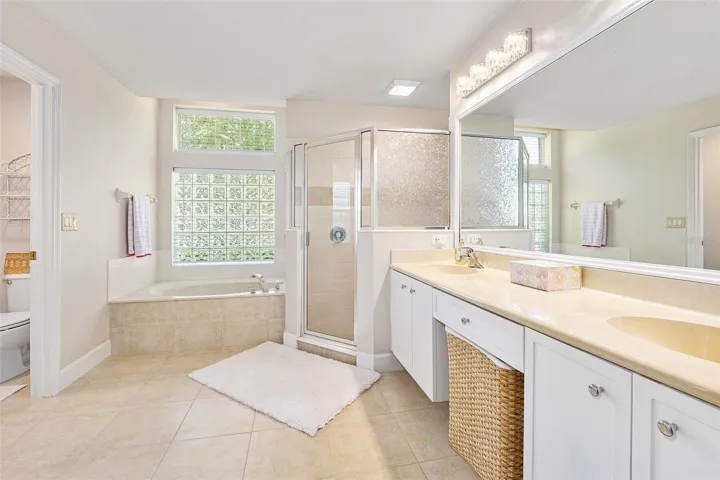 Large primary bathroom with water closet
