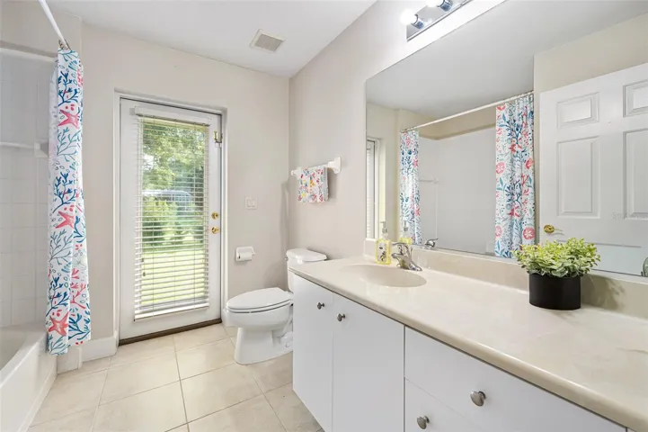 Main bathroom, door to backyard