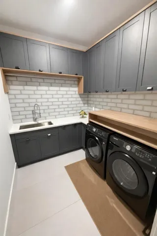 Modern laundry room with with washer and dryer