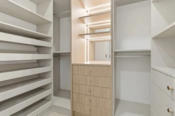 Custom walk-in closet with built-ins & LED lighting