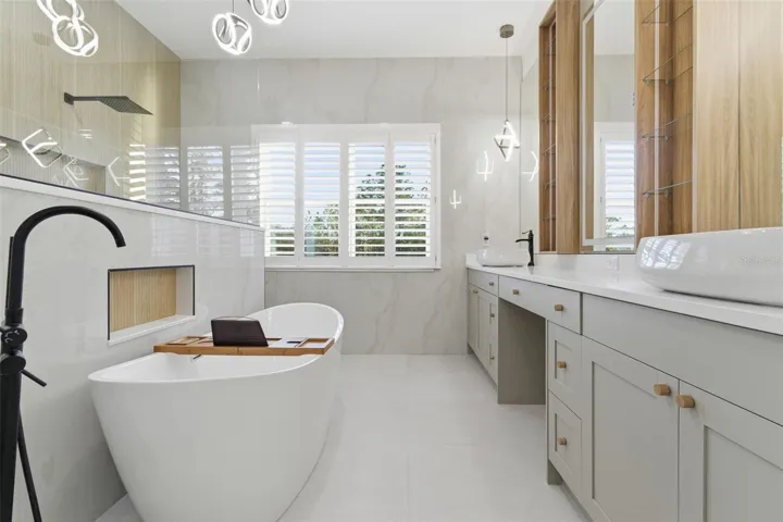 Master bathroom with freestanding tub and dual vanity