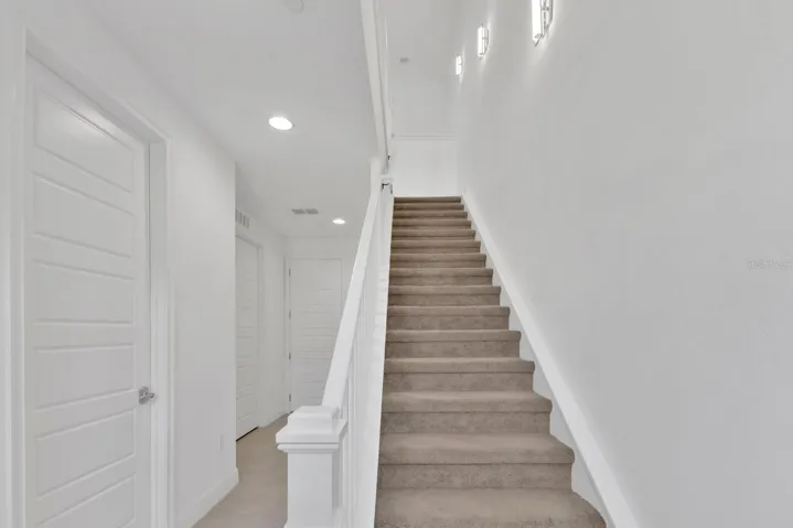 Foyer stairs to 2nd floor