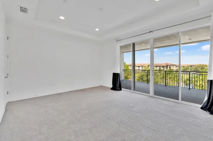 Primary leading onto 3rd floor balcony