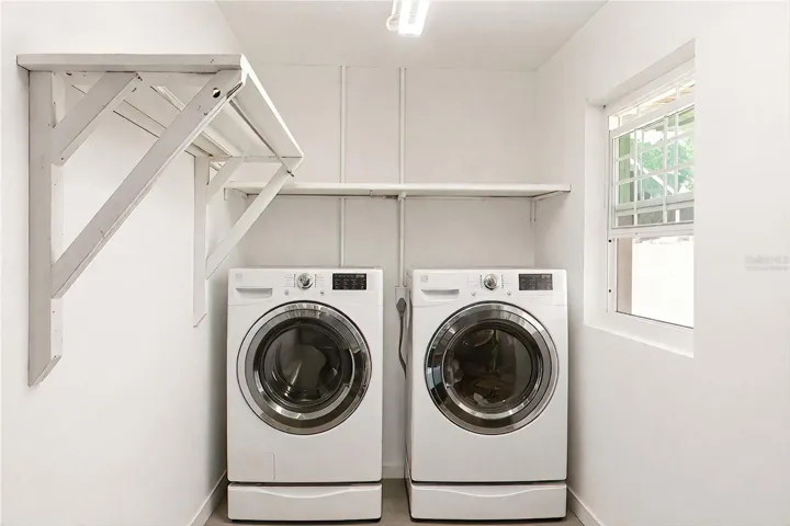Virtually staged.  Washer and Dryer are present, but all other items removed from pic