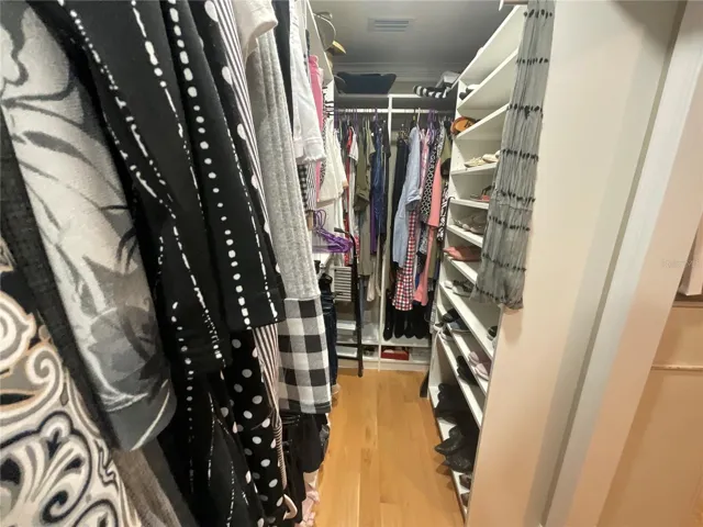 Closet with lots of shoe organization too