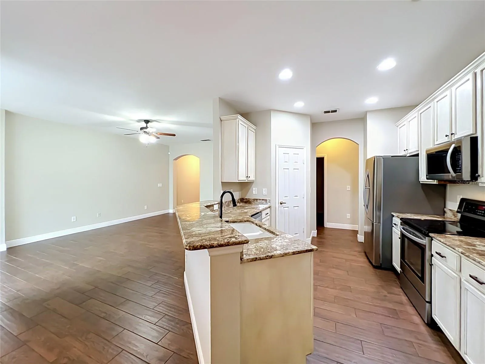 Open to the Family room and breakfest area