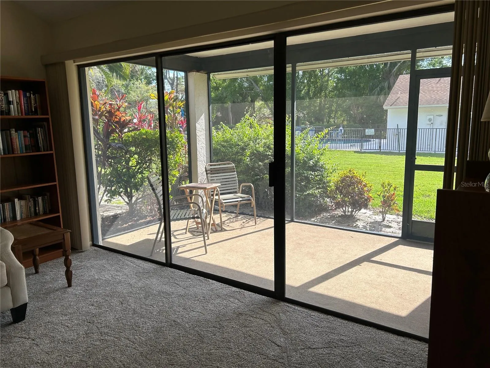 Lanai with direct access to the community pool