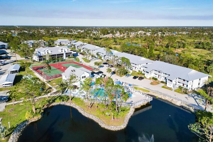 Aerial View Of Pool, Clubhouse & Tennis Courts.