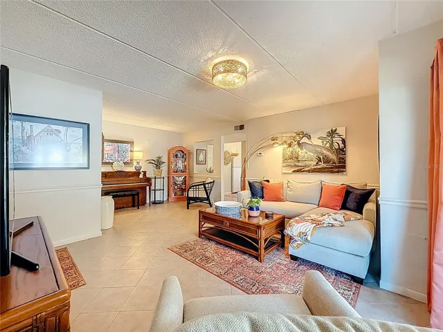 Living room looking from screened lanai