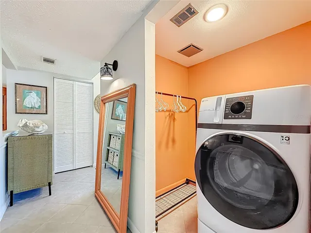 laundry looking towards kitchen/hall way