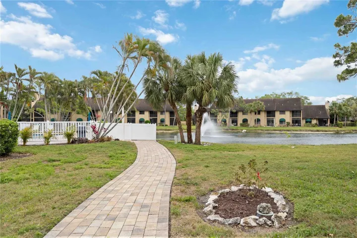 paved pathway to small, heated pool