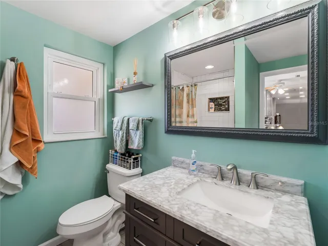 Bathroom 3 - located off eat in kitchen space