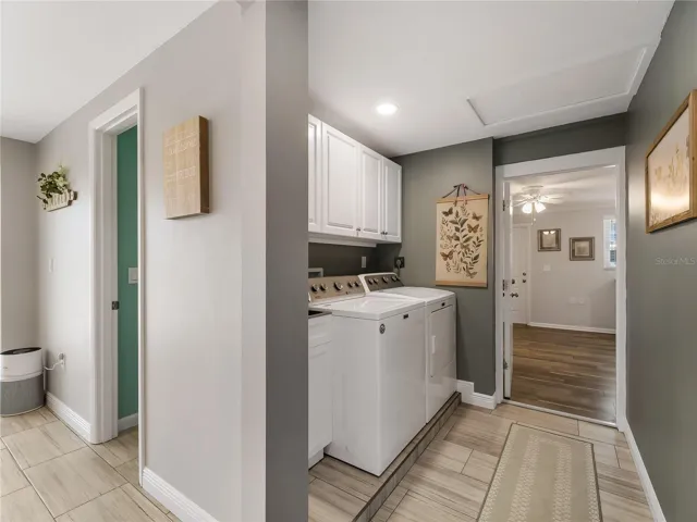 Laundry with storage closet