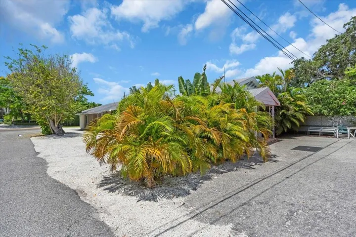 exterior front of 1761 siesta dr | 1761 Siesta Drive, 1760 & 1762 Wisconsin, Sarasota, FL 34239