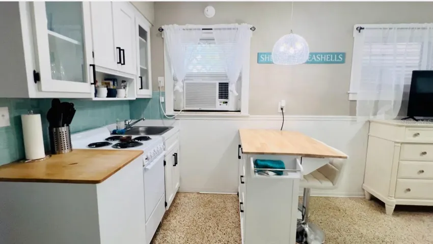 yellow studio back unit of 1760 wisconsin | 1761 Siesta Drive, 1760 & 1762 Wisconsin, Sarasota, FL 34239