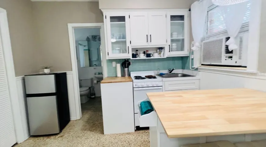 yellow studio back unit of 1760 wisconsin | 1761 Siesta Drive, 1760 & 1762 Wisconsin, Sarasota, FL 34239