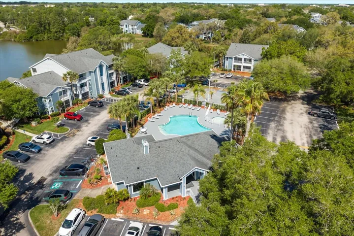 Community features 2 pools, clubhouse, 2 fitness centers, tennis courts, community dock, 2 gates and more...