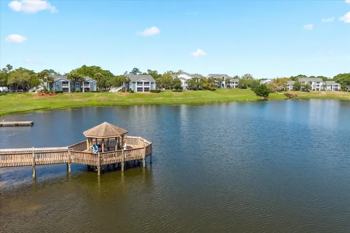 Building 35 with unit 103 is to the left in the background. Very close to community dock.