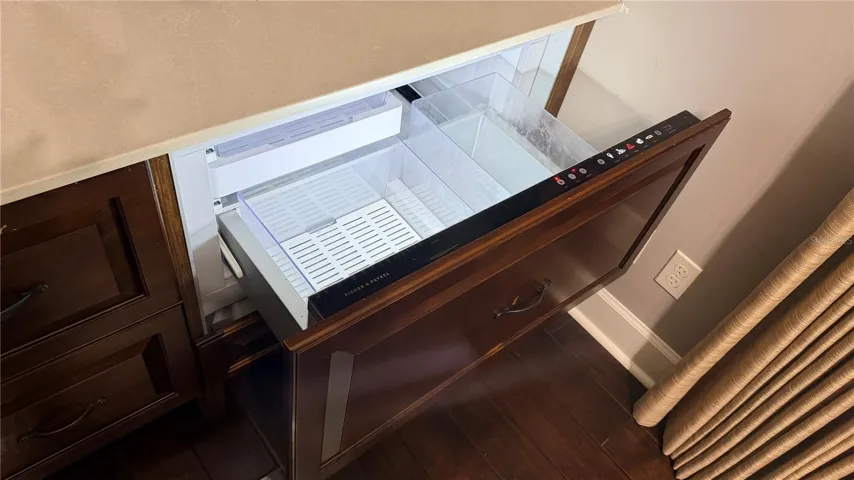 Built-in refrigerator in office cabinetry