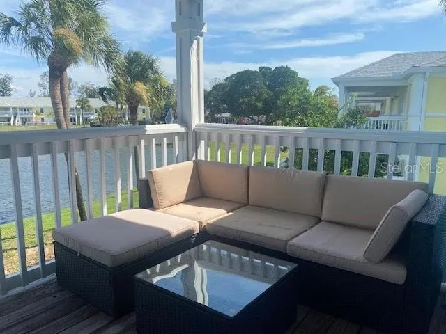 Pretty covered patio view with lake view