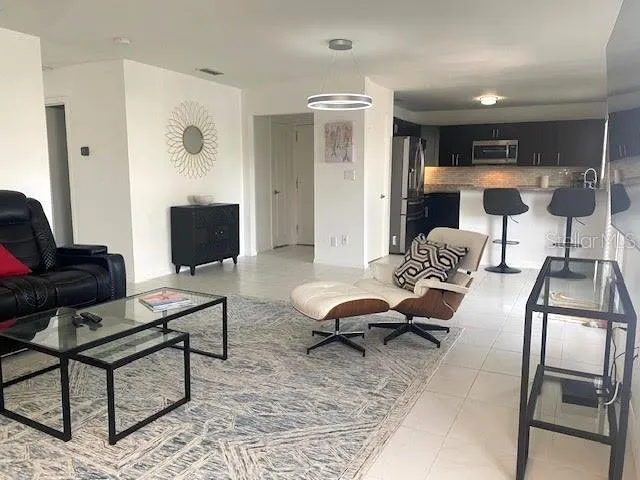 Open living/dining/ kitchen layout