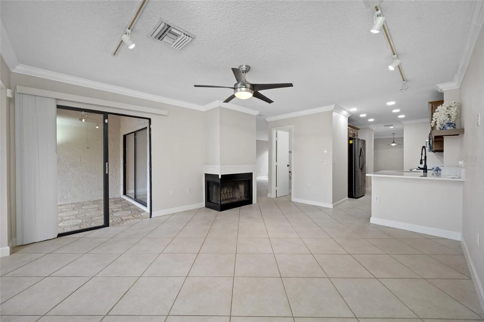 Family &amp; Kitchen with wood burning fireplace