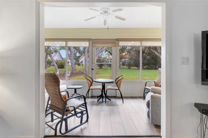 Glass windows on Florida room for climate control on those warm summer afternoons