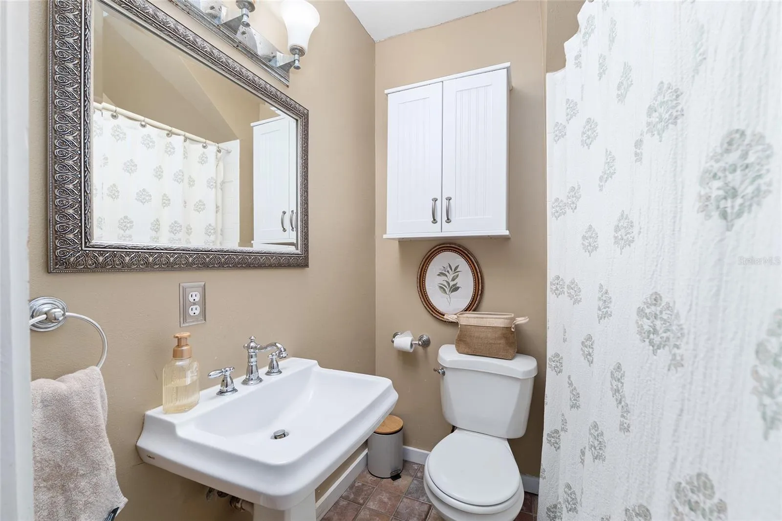 One of two full bathrooms.