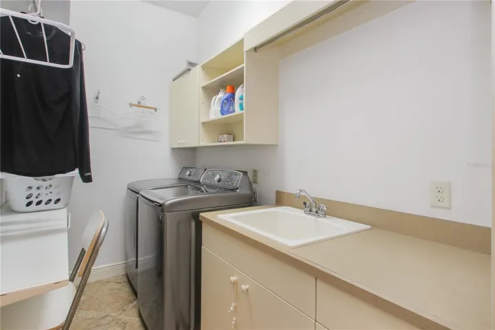 Laundry room with washout sink