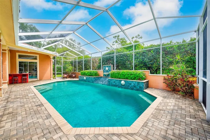 Huge, heated pool with lion head fountains.