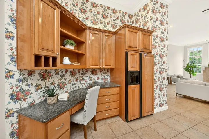 Built-in desk with more cabinet space.