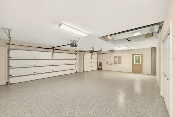 3 Car Garage with epoxy flooring.