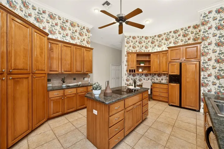 Center island with cooktop.