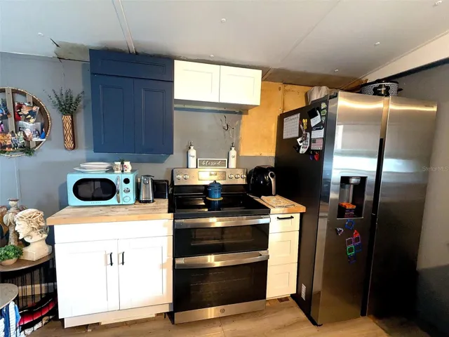 Kitchen featuring a stainless steel double oven, offering both style and functionality for everyday cooking and entertaining.