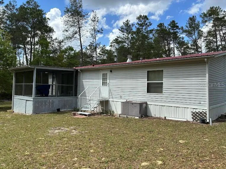 Back of house with porch