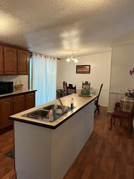 kitchen island, dining room to the right