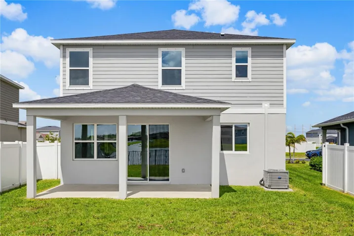 The private backyard is a blank canvas ready for your vision. Whether you envision a screened lanai, fire pit area, or tropical garden — the space is yours to create.