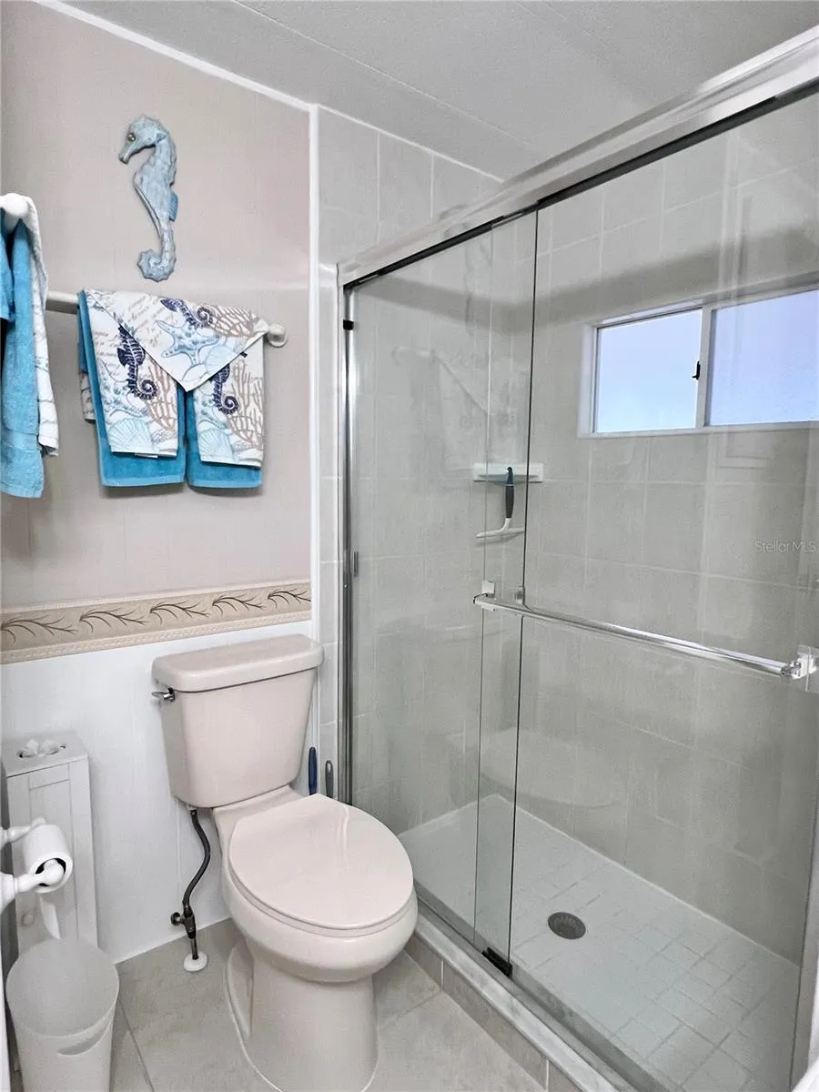 Hallway bathroom walk in shower between 2nd and 3rd bedrooms