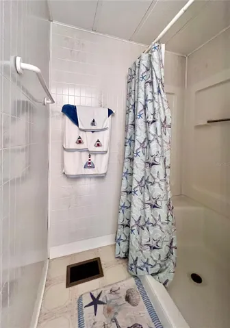 Primary bathroom walk in shower with seat