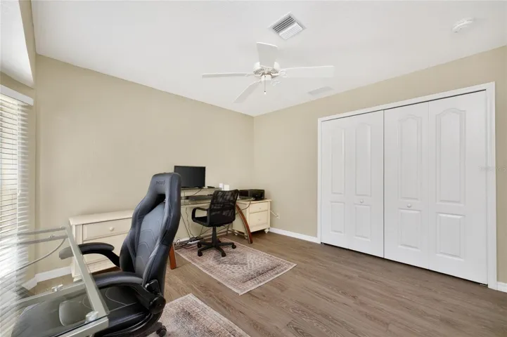 Good sized wall closet has plenty of storage.