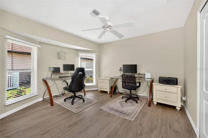 Guest bedroom #2 has updated Luxury vinyl plank flooring and a 2' bumpout, providing extra floor space.