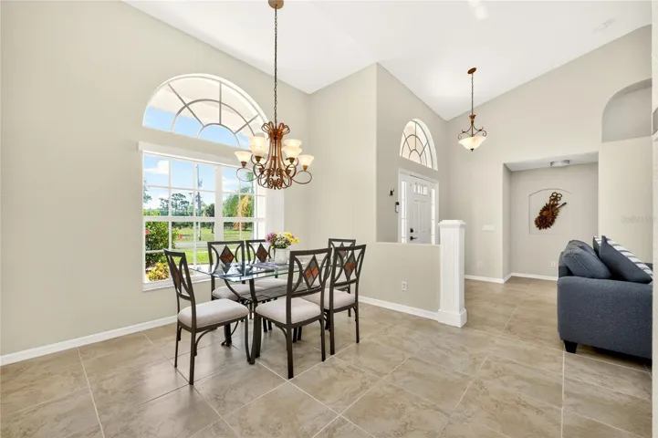 Dining area has a pretty chandelier