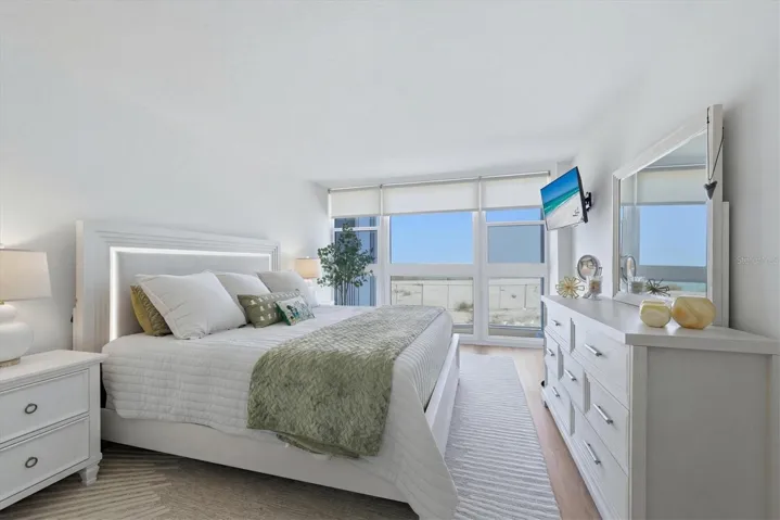 Primary with floor to ceiling windows