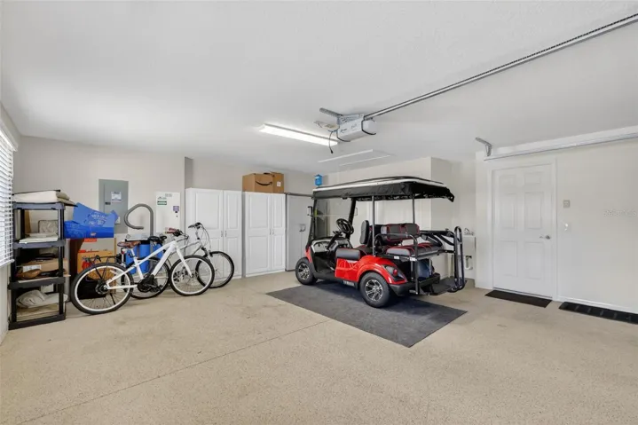 Garage with Included 4-Seater Yamaha Quiet Tech Drive 2 Golf Cart