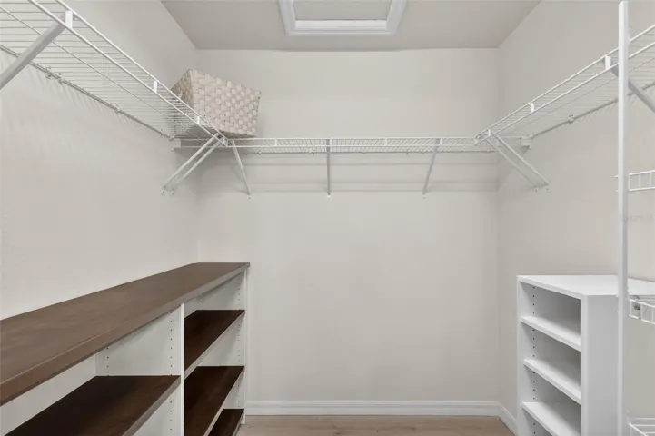 Primary Bedroom Walk-In Clloset