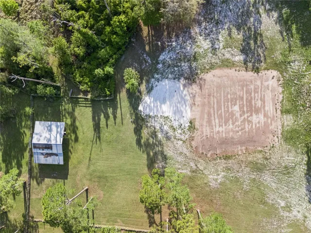 Bird's eye view of pole barn and house pad.