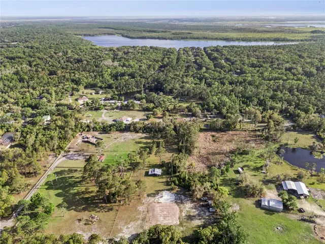 Bird's eye view of property and surrounding areas.